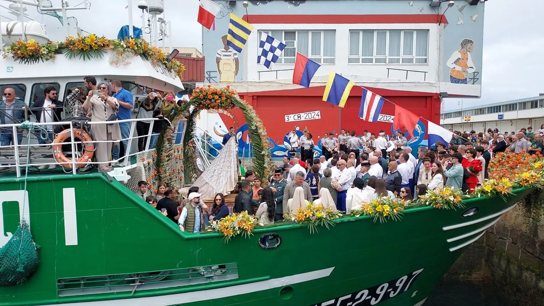 Crónica de la primera participación de un editor de tierra adentro en la procesión marítima.